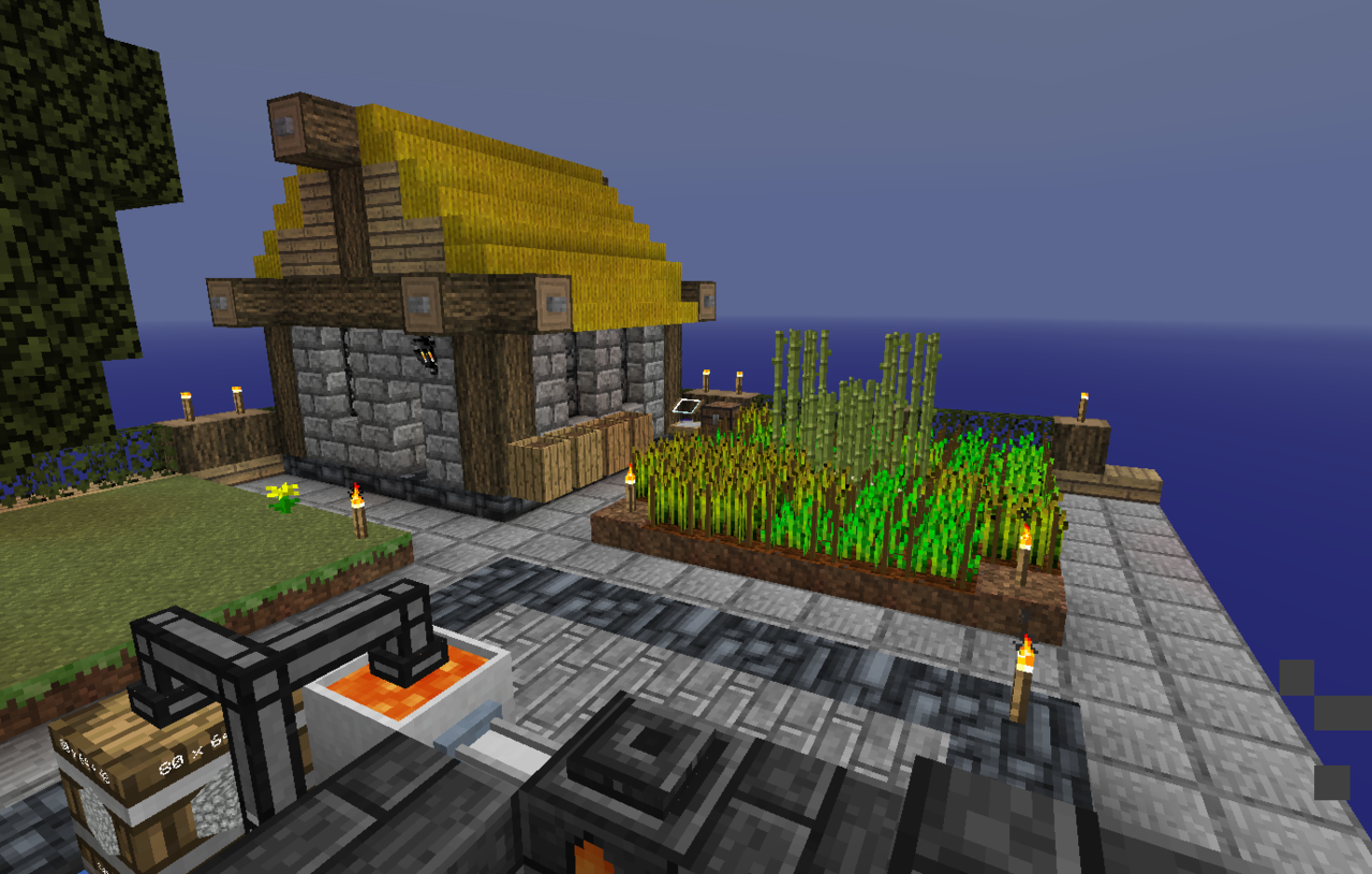 Just a simple square house with a thatch roof.  Compost buckets are on the side along with a...