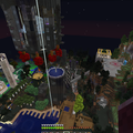 Production Town was built first, so its infrastructure is more complete. Witchery tower dwarfed by ongoing experiments, but a nice look at the lake and docks. Stuck a big ol Mystcraft portal...